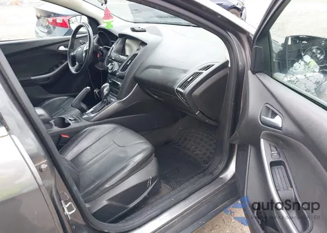 2014 Ford Focus Titanium z USA, uszkodzony, nr VIN 1FADP3N24EL380089